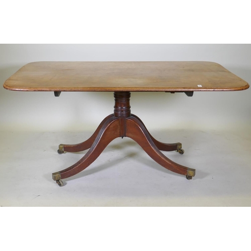 1092 - A mahogany breakfast table with an associated top, 95 x 148cm, 73cm high