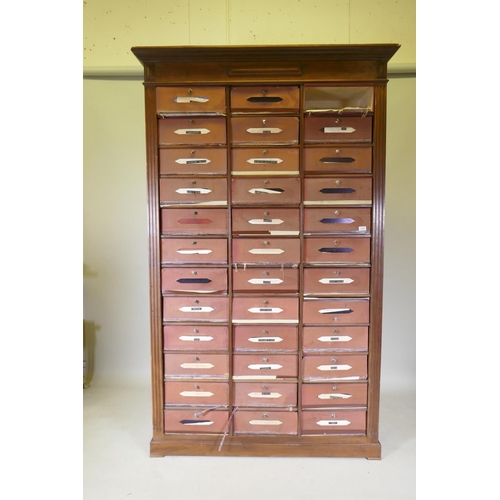 1105 - A French walnut filing cabinet/cartonniere, comprising 36 removable file boxes, first half C20th, 13... 