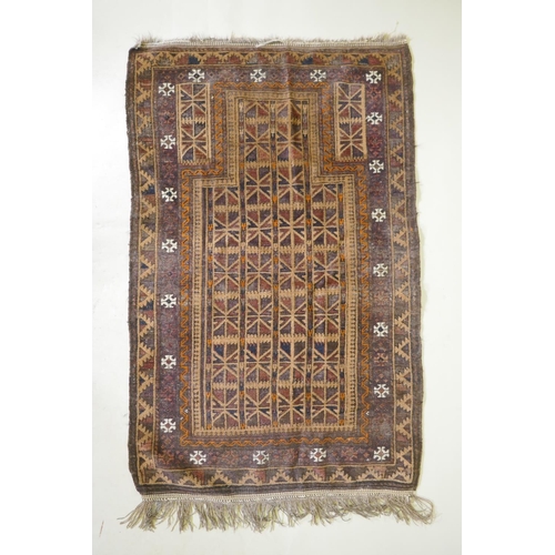 1115 - An antique Persian handwoven brown ground prayer mat with geometric directional design, worn, 96 x 1... 