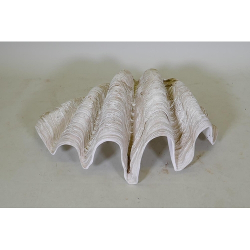 112 - A resin cast model of a clam shell, 74cm wide