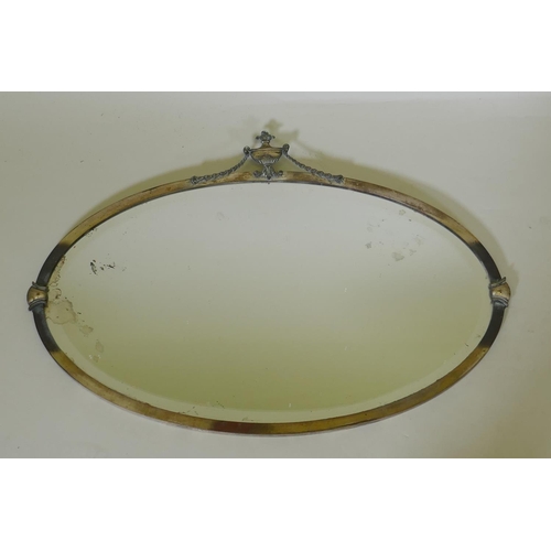 1121 - An antique Adam style silver plated oval wall mirror, 72 x 51cm