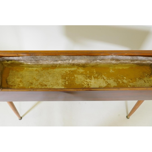 1126 - A mid-century planter with rosewood design, formica sides, pine lined with a metal liner, raised on ... 