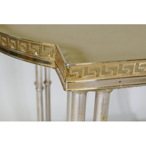 1127 - A mid century gilt metal two tier side table, with pierced gallery top, faux leather tops united by ... 