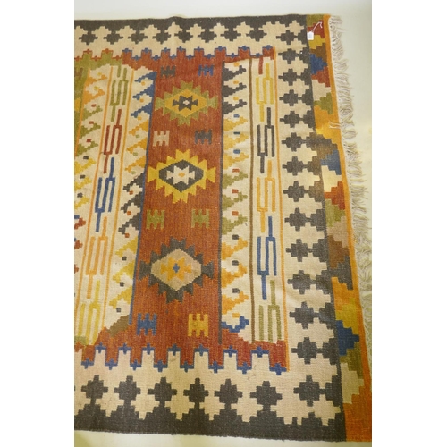 1133 - A woven wool kilim rug with geometric designs, 160 x 230cm