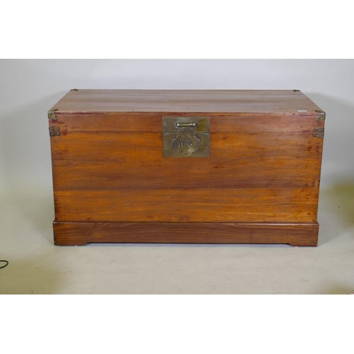 1139 - An oriental hardwood coffer with brass mounts, 126 x 60 x 66cm