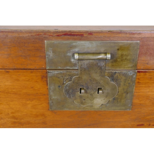 1139 - An oriental hardwood coffer with brass mounts, 126 x 60 x 66cm