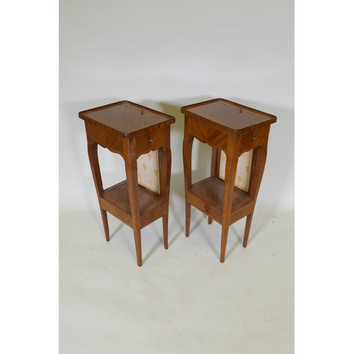 1143 - A pair of French parquetry lamp tables, with pull up screens and frieze drawer, the undertier with l... 