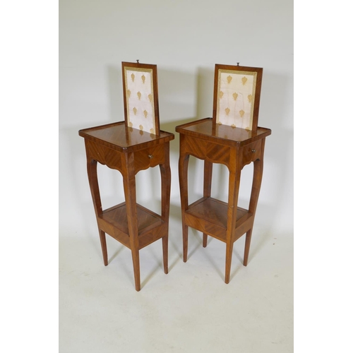 1143 - A pair of French parquetry lamp tables, with pull up screens and frieze drawer, the undertier with l... 