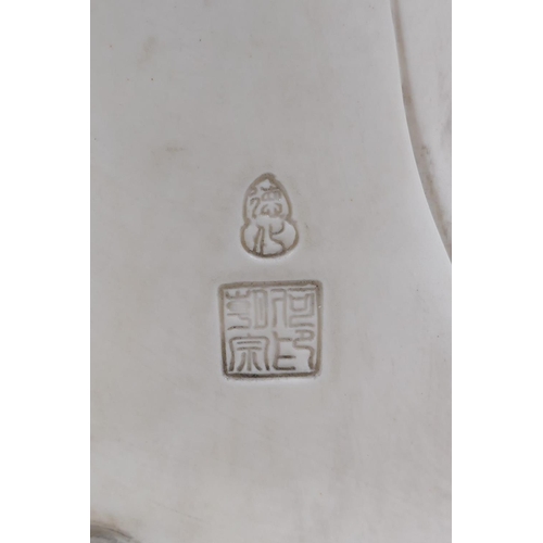 118 - A Chinese blanc de chine porcelain figure of Quan Yin, impressed seal mark to the reverse, 25cm high