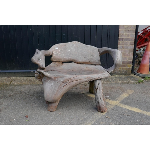 1182 - A root-wood garden bench, 120cm wide