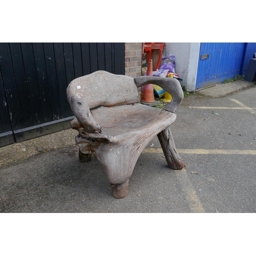 1182 - A root-wood garden bench, 120cm wide