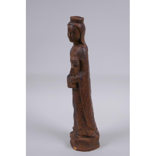 119 - A terracotta figure of Mary and Jesus, 27cm high