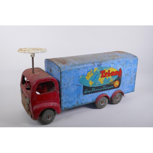 12 - A vintage Triang toys tinplate 'long distance transport' lorry with a sit and steer option, 60cm lon... 