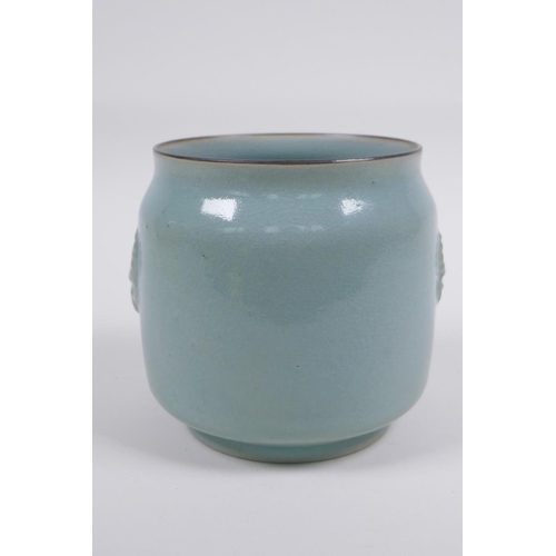 120 -  Chinese Ru ware style celadon glazed jar with twin mask decoration, 12cm high x 12cm diameter