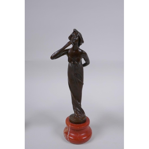 124 - Three Art Nouveau style bronzes of women, 22cm highest