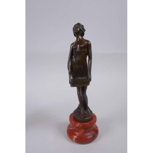 124 - Three Art Nouveau style bronzes of women, 22cm highest