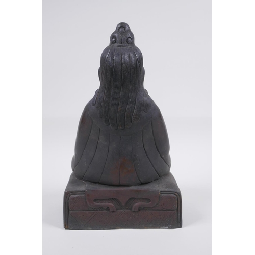 126 - A Sino Tibetan bronze figure of a bearded deity seated in meditation, 29cm high