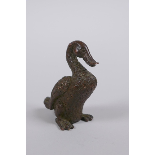 130 - A Japanese style bronze okimono duck, mark to base, 5cm high