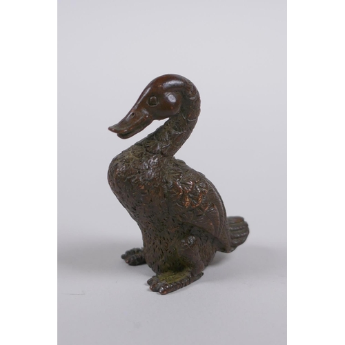 130 - A Japanese style bronze okimono duck, mark to base, 5cm high