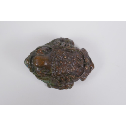 135 - A Chinese bronze chan chu, 7cm long