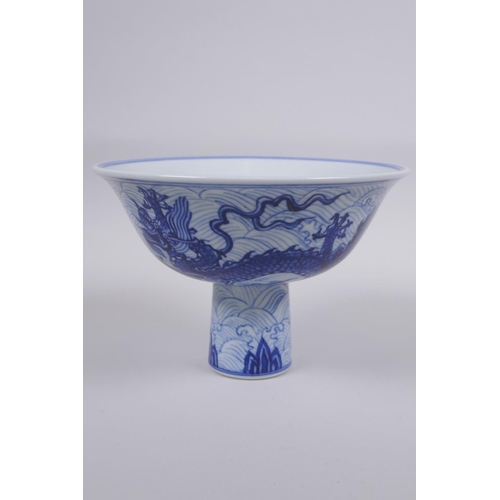 141 - A blue and white porcelain stem bowl with dragon decoration, Chinese Xuande 6 character mark to bowl... 