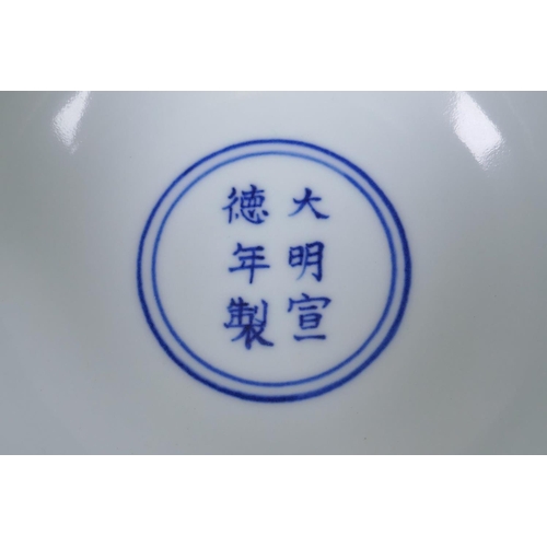 141 - A blue and white porcelain stem bowl with dragon decoration, Chinese Xuande 6 character mark to bowl... 