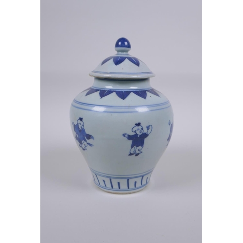 143 - An early C20th Chinese blue and white porcelain ginger jar and cover, decorated with children at pla... 