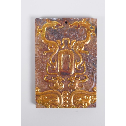 148 - A Chinese carved jade tablet with applied gilt metal detail to the dragon and phoenix, 8 x 12cm