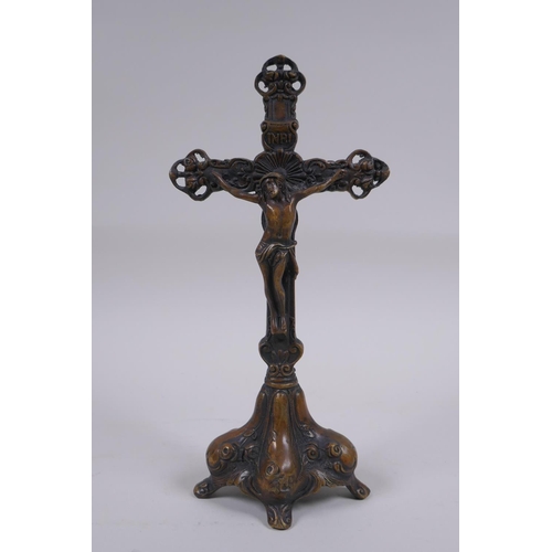 149 - A cast bronze crucifix, 24cm high