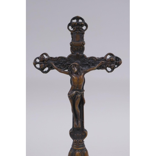 149 - A cast bronze crucifix, 24cm high