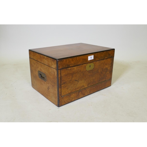 15 - A C19th walnut correspondence box with brass military style handles and mounts, and ebonised banding... 