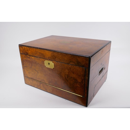 15 - A C19th walnut correspondence box with brass military style handles and mounts, and ebonised banding... 