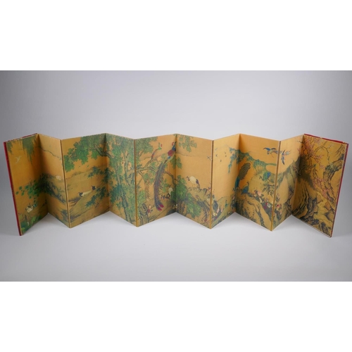 153 - A Chinese printed concertina book depicting an extensive landscape with numerous asiatic birds, 18 x... 