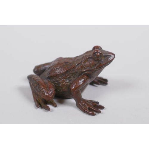 160 - A Japanese style bronze okimono toad, mark to base, 4cm long