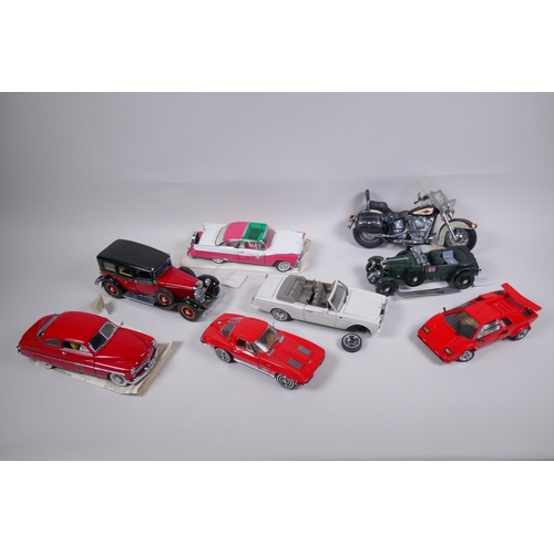 168 - A collection of six Franklin Mint diecast scale model cars including a Ford Crown Victoria, a Merced... 