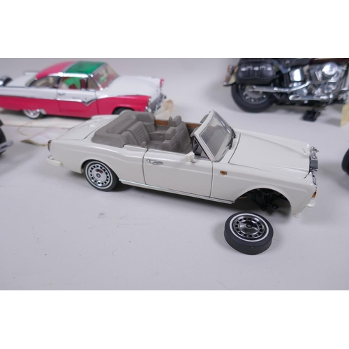 168 - A collection of six Franklin Mint diecast scale model cars including a Ford Crown Victoria, a Merced... 