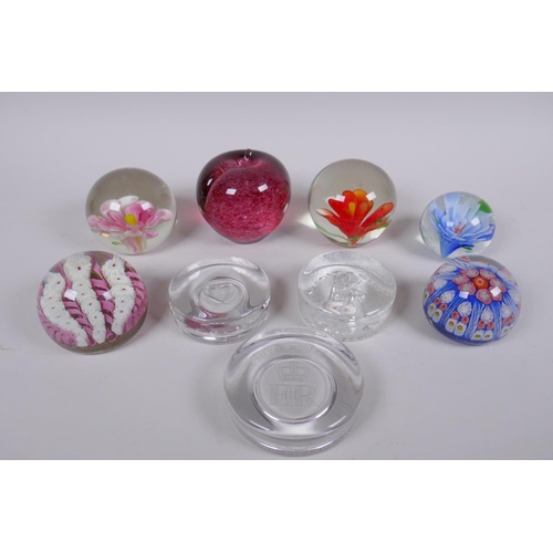 175 - A collection of art glass paperweight including two millefiori, three with floral decoration etc, la... 