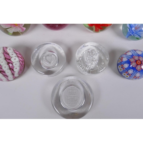 175 - A collection of art glass paperweight including two millefiori, three with floral decoration etc, la... 