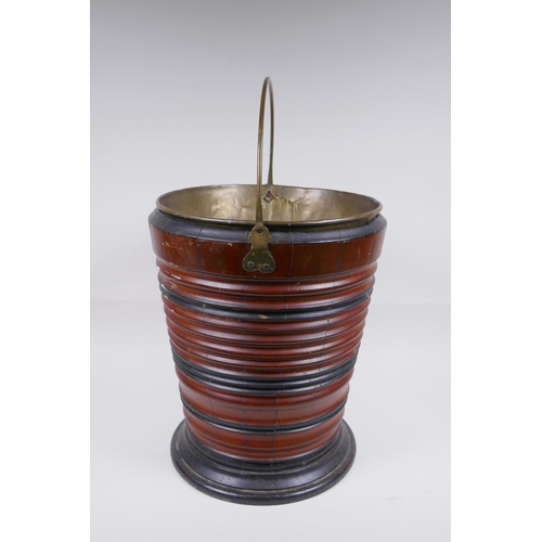 176 - A Dutch coopered fruitwood and brass lined peat bucket, 34cm high, 28cm diameter