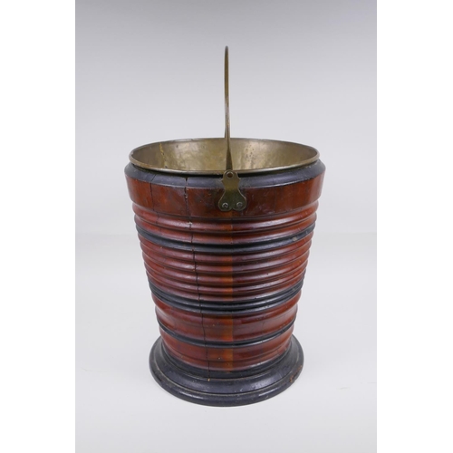 176 - A Dutch coopered fruitwood and brass lined peat bucket, 34cm high, 28cm diameter