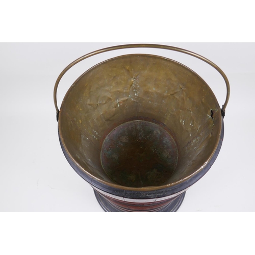 176 - A Dutch coopered fruitwood and brass lined peat bucket, 34cm high, 28cm diameter