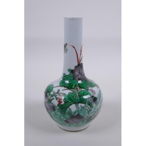 18 - A C19th Chinese famille vert porcelain bottle vase with lotus flower decoration, 18cm high