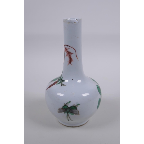 18 - A C19th Chinese famille vert porcelain bottle vase with lotus flower decoration, 18cm high