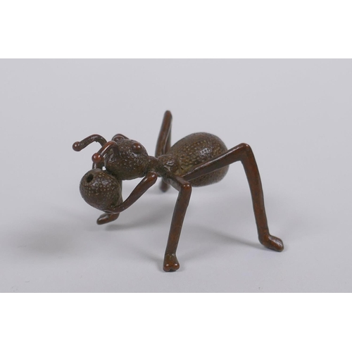 181 - A Japanese style bronze okimono ant incense stick holder, indistinct mark to base, 5cm long