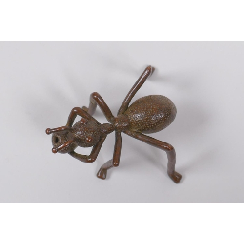 181 - A Japanese style bronze okimono ant incense stick holder, indistinct mark to base, 5cm long