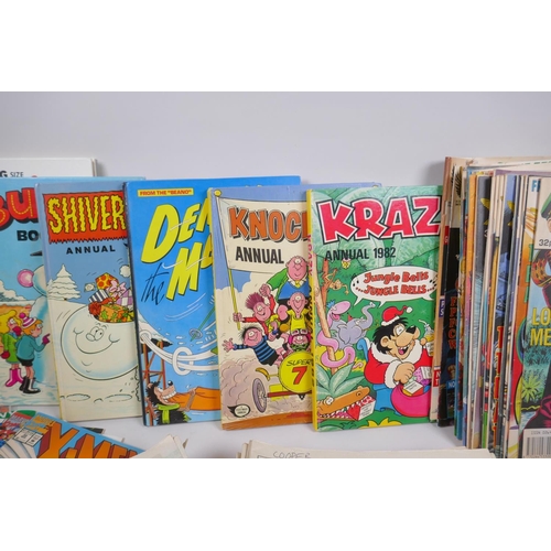 184 - A quantity of American and British comics, and a quantity of annuals including Marvel comics The Unc... 