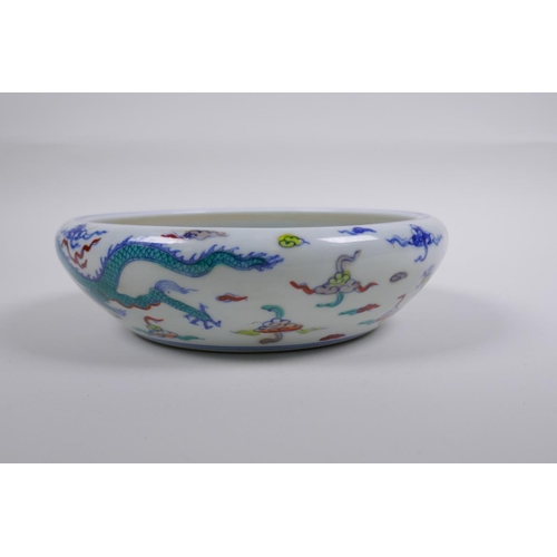 188 - A Chinese Doucai porcelain dish with rolled rim, decorated with dragons, Chenghua 6 character mark t... 