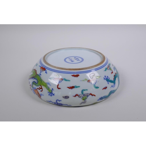 188 - A Chinese Doucai porcelain dish with rolled rim, decorated with dragons, Chenghua 6 character mark t... 