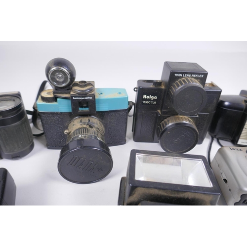 189 - A collection of assorted 35mm, 120mm and digital cameras and accessories including Canon ECS 1000F a... 