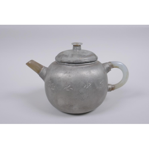 193 - A Chinese painted YiXing teapot with a grey hardstone handle and spout, impressed seal mark to base,... 